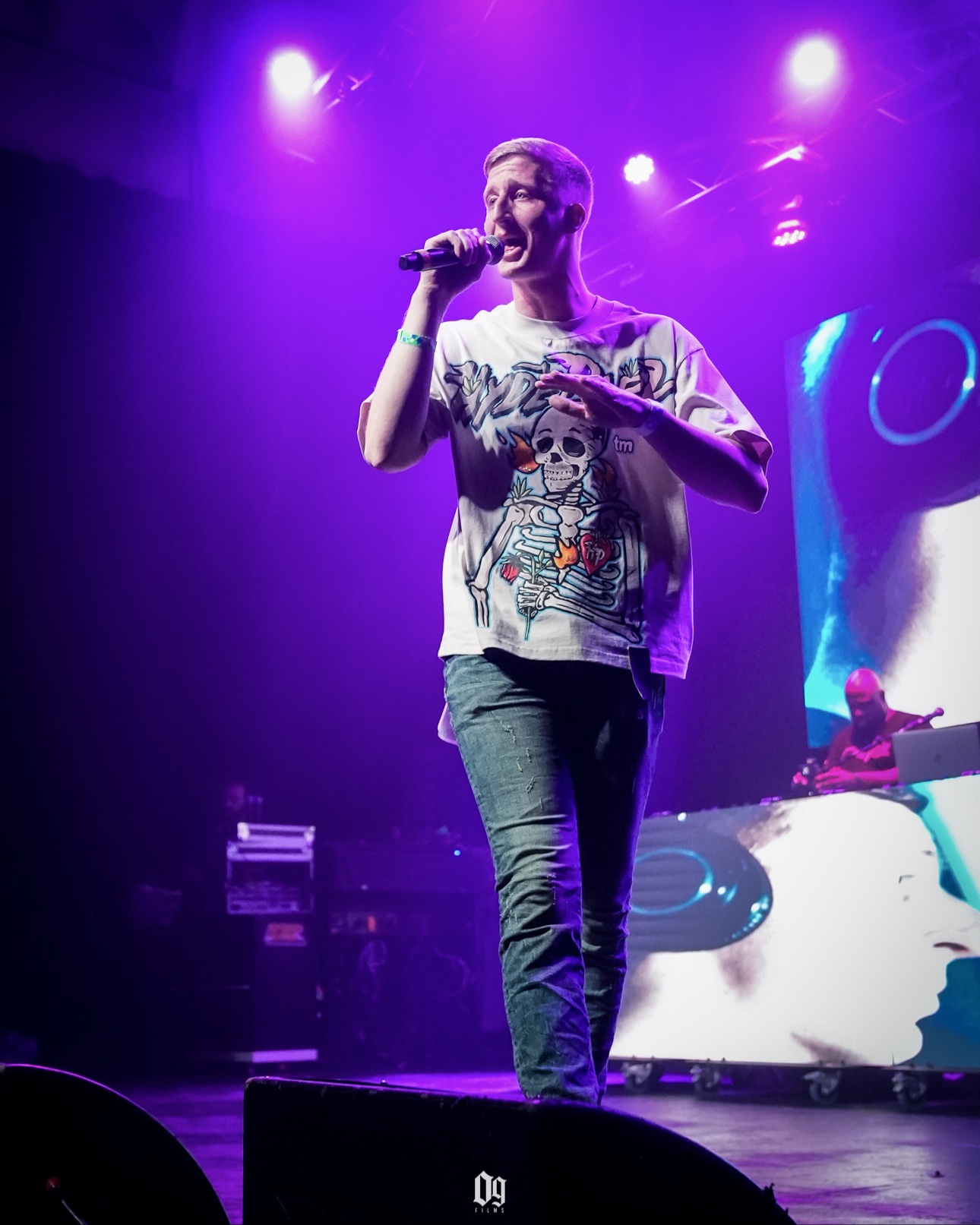 C-Hold performing with a DJ while opening for Boosie and Lil Keke